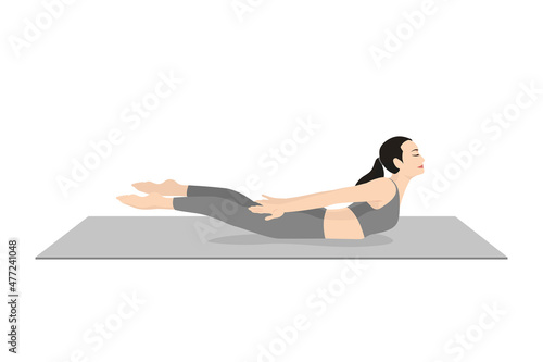 Locust Pose, One-legged Locust Pose,Shalabhasana, Salambhasana. Beautiful girl practice Salabhasana. Young attractive woman practicing yoga exercise. working out, black wearing sportswear, grey pant