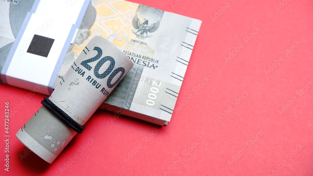 Indonesian Rupiah the official currency of Indonesia. Business and finance concept, Uang 2000 Rupiah Bank Indonesia. Uang Rupiah. Indonesian Rupiah the official currency of Indonesia. Business and finance concept, Uang 2000 Rupiah Bank Indonesia. Uang Rupiah.