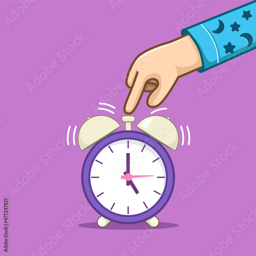 People turn off the ringing of the alarm clock by pressing a button on the analog clock