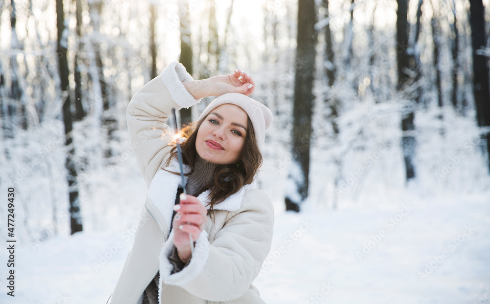 girl with sparkles Bengal fire in winter outdoor. Happy New Year concept. Christmas holiday girl with sparkles Bengal fire in winter outdoor. Happy New Year concept. Christmas holiday