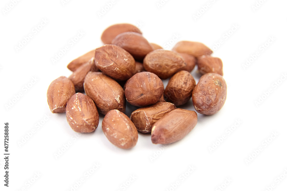Obraz premium Peanuts isolated on white background. Shelled seeds