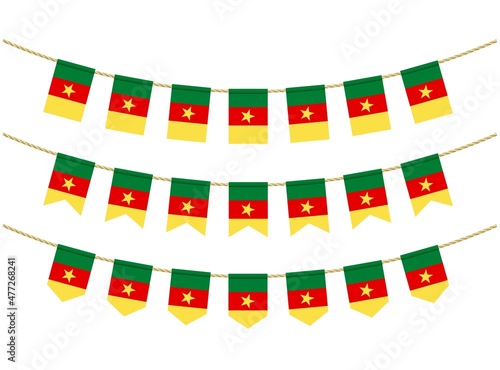 Cameroon flag on the ropes on white background. Set of Patriotic bunting flags. Bunting decoration of Cameroon flag