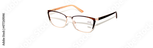 Glasses for vision brown in different positions on a white background