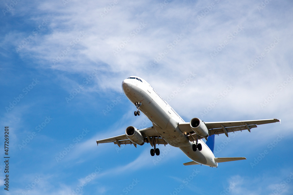 a airplane on blue sky go to vacations