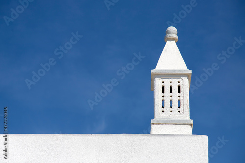 a Decorative chimney with blue sky,  Andalucia, Spain
