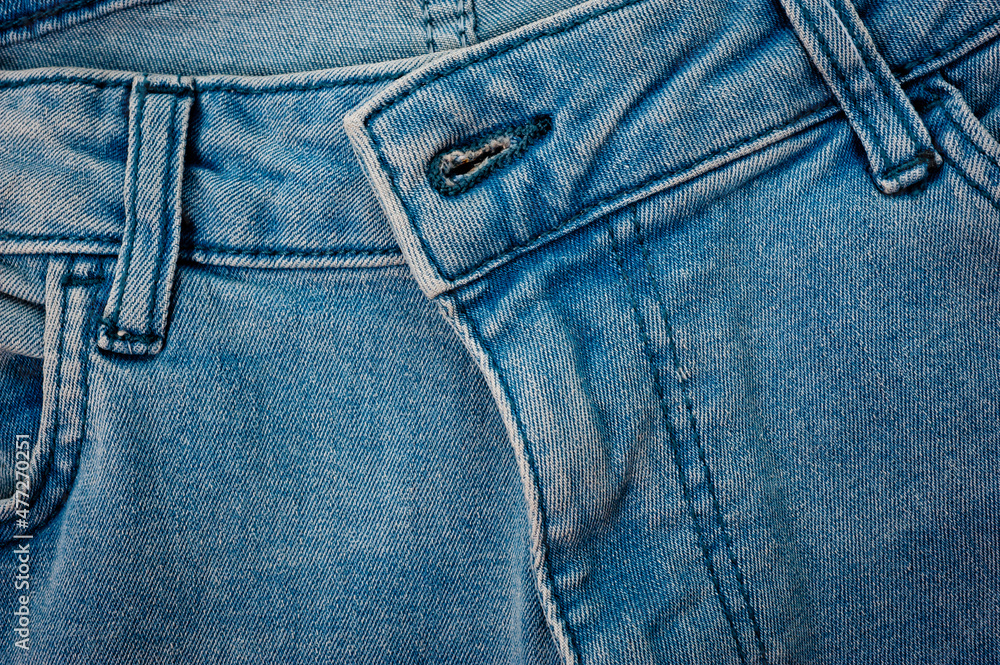 Close up of blue denim texture with sewing. Close up of blue denim texture with sewing.