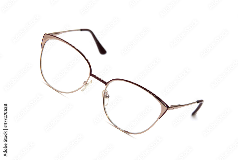 Glasses for women. fashionable for sight. from glass. beautiful shape. on an isolated white background. Glasses for women. fashionable for sight. from glass. beautiful shape. on an isolated white background.