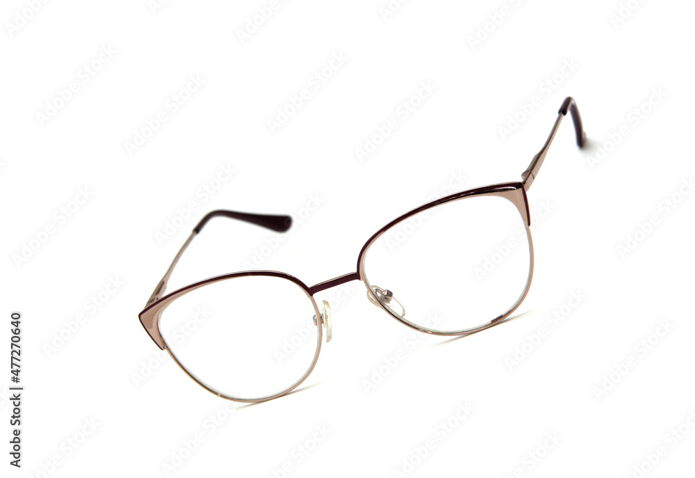 Glasses for women. fashionable for sight. from glass. beautiful shape. on an isolated white background. Glasses for women. fashionable for sight. from glass. beautiful shape. on an isolated white background.