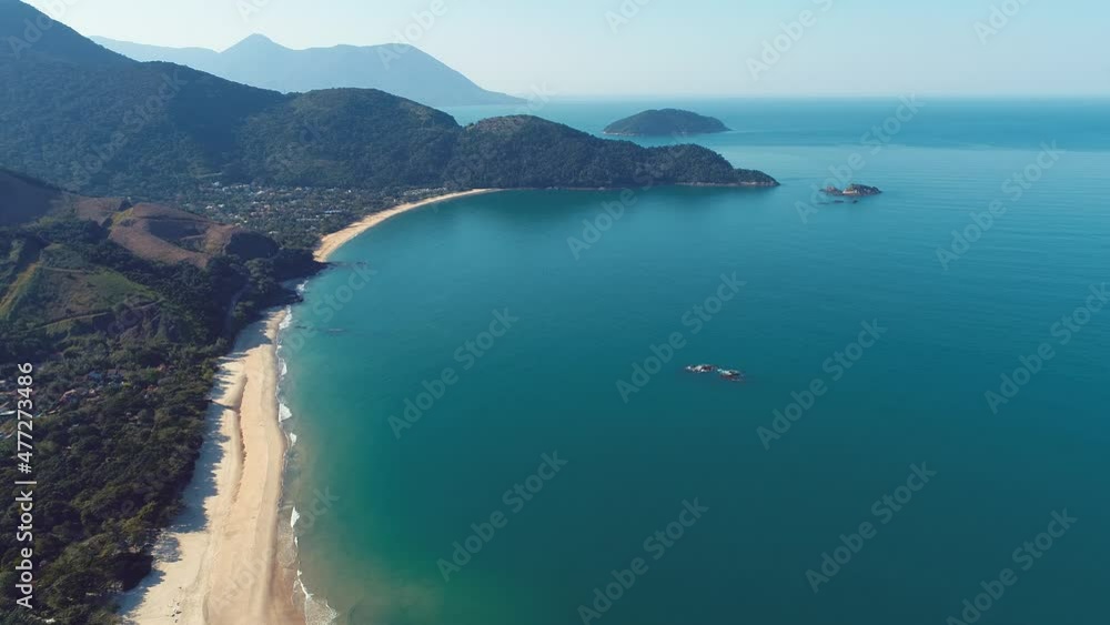 Maresias Beach travel destination in Brazil. Beach scene of summer landscape. Tropical environment outdoors. Vacations scenery. Luxury relaxation scenery. Maresias Beach travel destination in Brazil. Beach scene of summer landscape. Tropical environment outdoors. Vacations scenery. Luxury relaxation scenery.