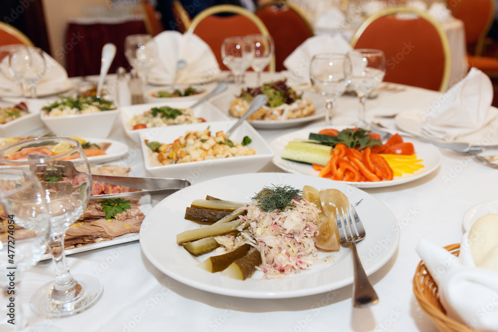 Set table with pickles, meats, fish and salads Set table with pickles, meats, fish and salads