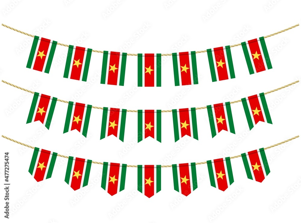 Obraz premium Suriname flag on the ropes on white background. Set of Patriotic bunting flags. Bunting decoration of Suriname flag