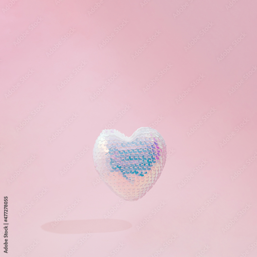 disco heart flying.love concept design.aesthetic heart design on a soft pink background.valentine holidays idea.happy festive celebration