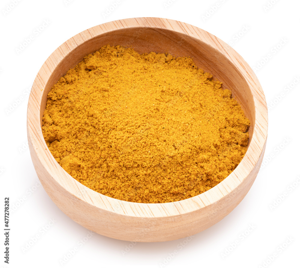 Turmeric Powder in a wooden Bowl on white background, Curry Powder isolated on white background With clipping path. Turmeric Powder in a wooden Bowl on white background, Curry Powder isolated on white background With clipping path.