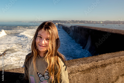 cute little girl on beach vacation in the Pyrénées-Atlantiques photo