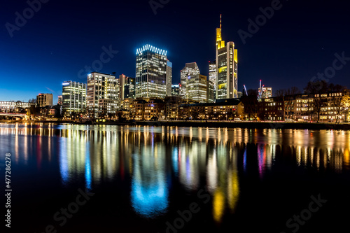 The skyline of Frankfurt - Main at night at a cold day in winter.