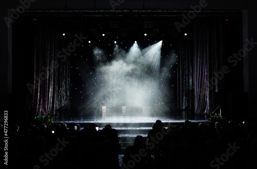 Theatrical scene without actors, scenic light and smoke