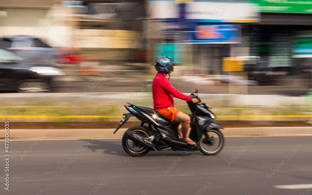 Random Motorbiker at the street Random Motorbiker at the street