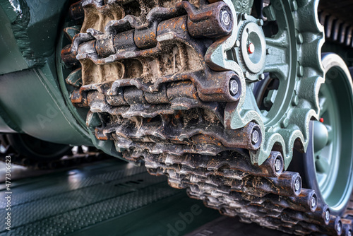 Tela Steel army tank caterpillar tread tracks, closeup detail