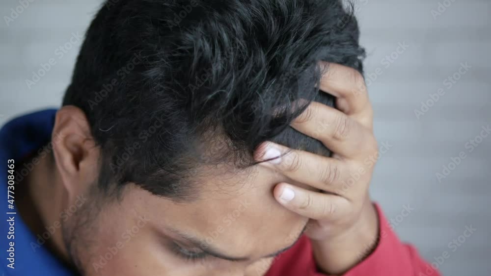 hair loss concept with man checking his hair hair loss concept with man checking his hair