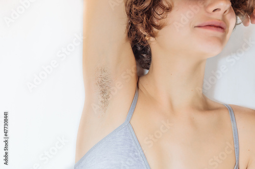 Armpit hair on a young teenager photo