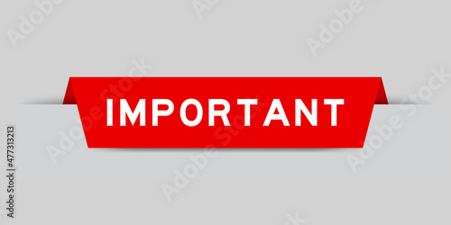 Red color inserted label with word important on gray background