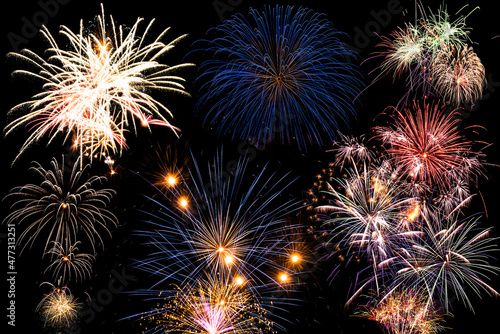 Canvas Print New year celebration fireworks against dark sky. Composition.
