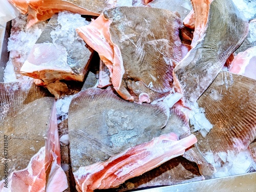 Close -up photos of Dasyatidae fish cuttings found on wet market sales shelves
