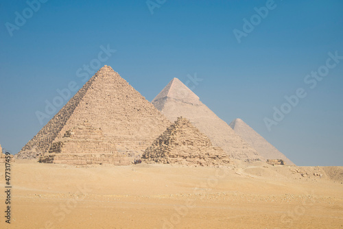 Landscape of the pyramids in the desert with blue sky in Giza, Egypt