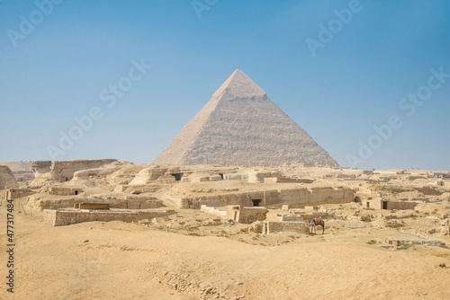Landscape of the pyramids in the desert with blue sky in Giza, Egypt