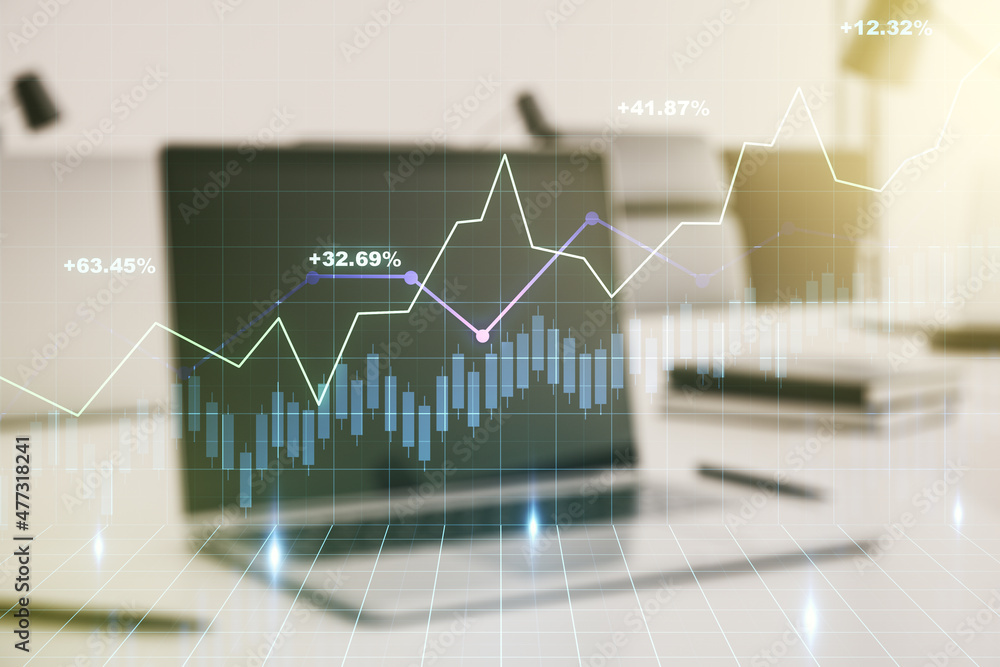 Abstract creative financial graph on modern laptop background, forex and investment concept. Multiexposure Abstract creative financial graph on modern laptop background, forex and investment concept. Multiexposure