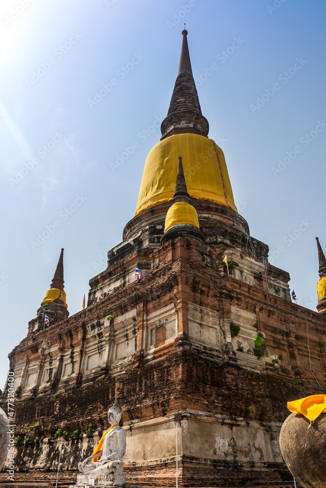 Fototapeta premium Ayutthaya Historical Park covers the ruins of the old city of Ayutthaya (The invincible City) , Thailand. The Capital of the Kingdom of Siam an historic 13th century city. 