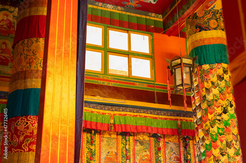 Colourful interior decoration of a Buddhist monastery in Ralong, Sikkim, India