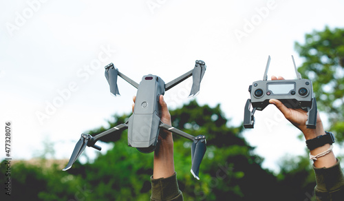 unmanned aerial photography equipment drone Hands and drones with camera taking 4k video
