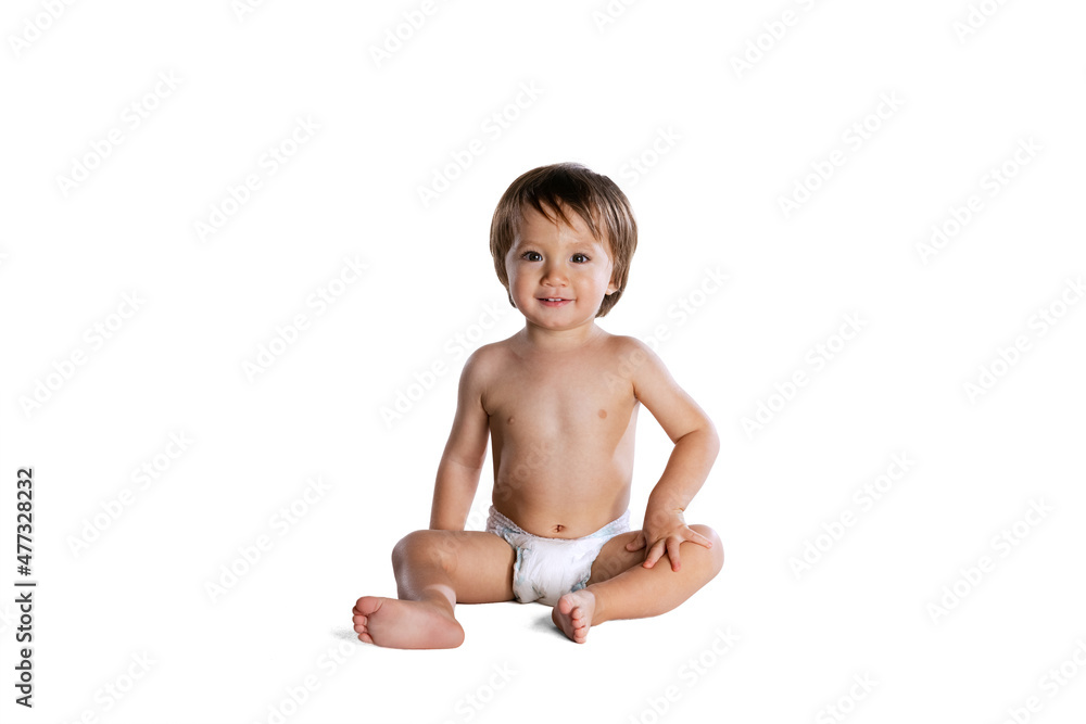 Happy little boy, baby, child in diaper isolated over white studio background. Childhood concept Happy little boy, baby, child in diaper isolated over white studio background. Childhood concept