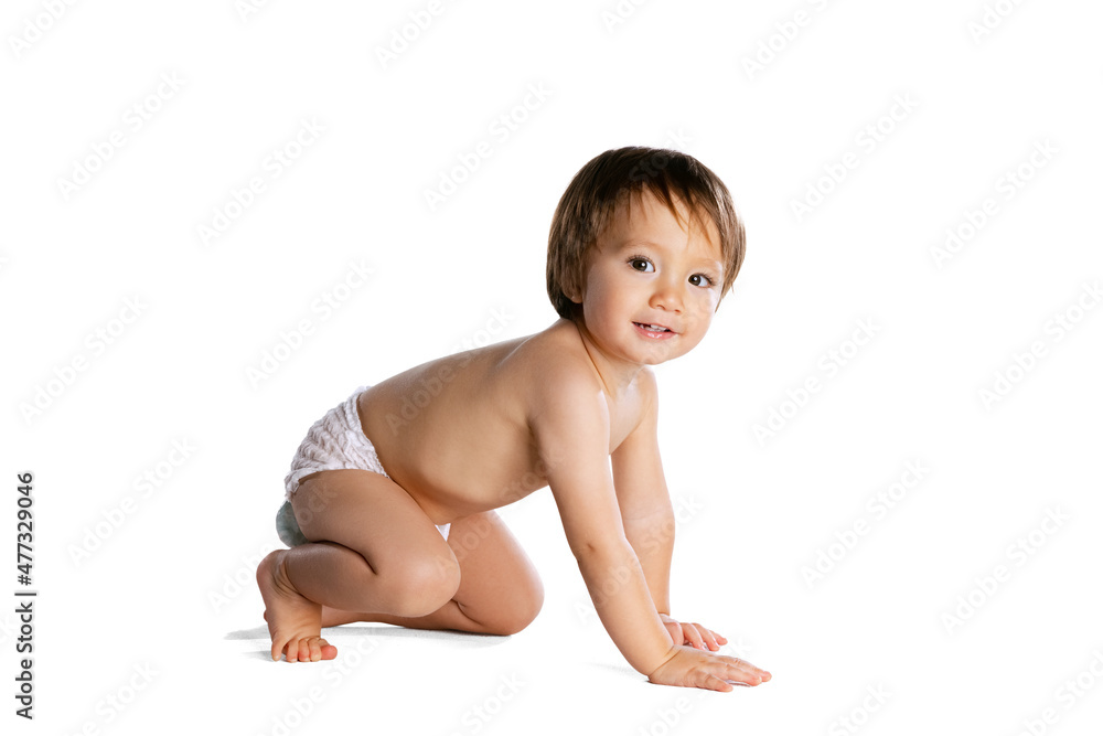 Portrait of little boy, baby, child in diaper isolated over white studio background. Childhood concept Portrait of little boy, baby, child in diaper isolated over white studio background. Childhood concept
