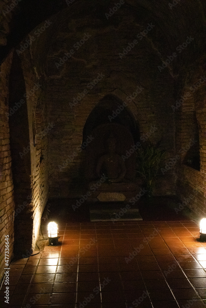 Fototapeta premium a Buddha Sculpture inside the tunnel