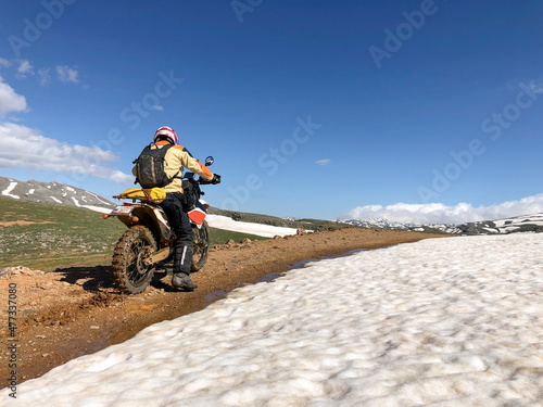Springtime motorcycle ride in mysterious mountains