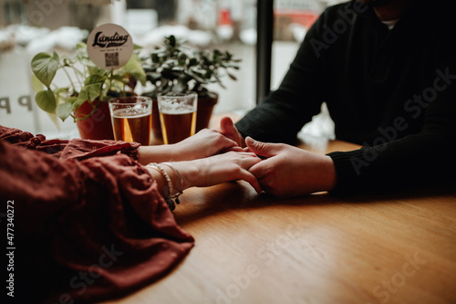 holding hands on a date
