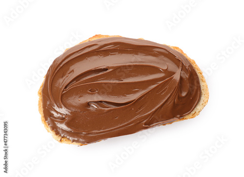 Bread with tasty chocolate spread on white background, top view