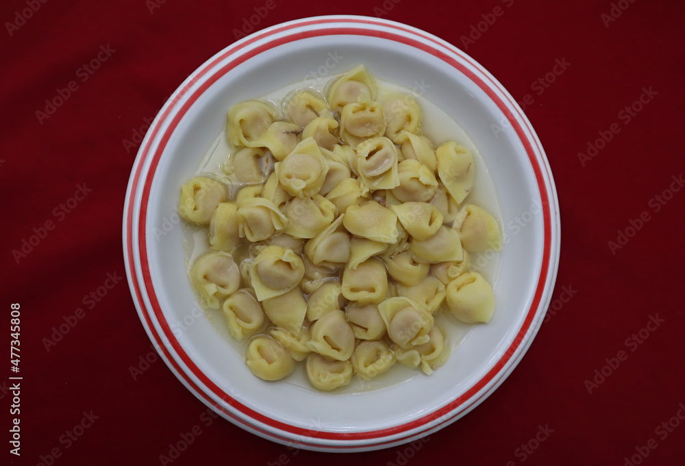 Italian Tortellini in brodo. Traditional Bologna dish for Christmas and New Years Eve.