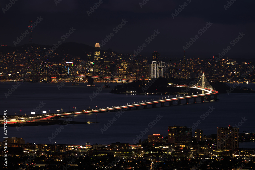 San Francisco lit up the night with holidays lights via Berkeley Hills.