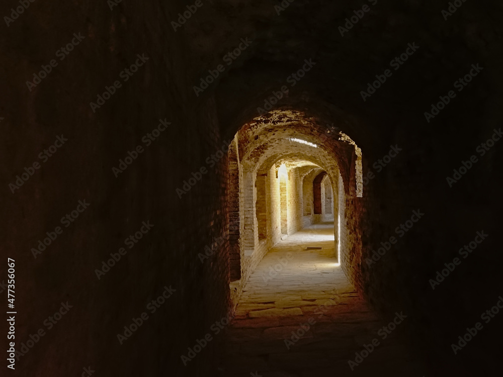 Tunnel under a roman amphitheatre at Italica, Roman city in the province of Hispania Baetica