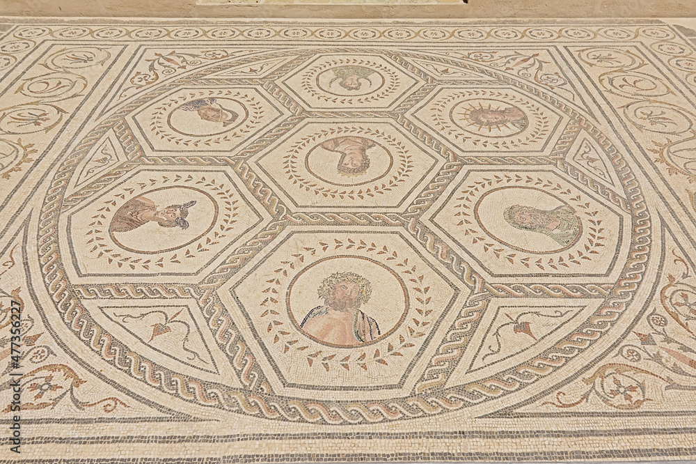 Ornate ancient roman floor mosaic wih geometrical patterns in Archeological excavation of the ruins of Italica, Roman city in the province of Hispania Baetica near the current village of Santiponce, 