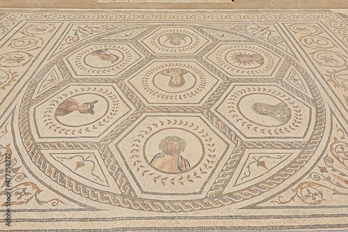 Ornate ancient roman floor mosaic wih geometrical patterns in Archeological excavation of the ruins of Italica, Roman city in the province of Hispania Baetica near the current village of Santiponce, 