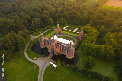 Aerial view of Ooidonk castle during sunset, situated near Gent, Belgium. photo