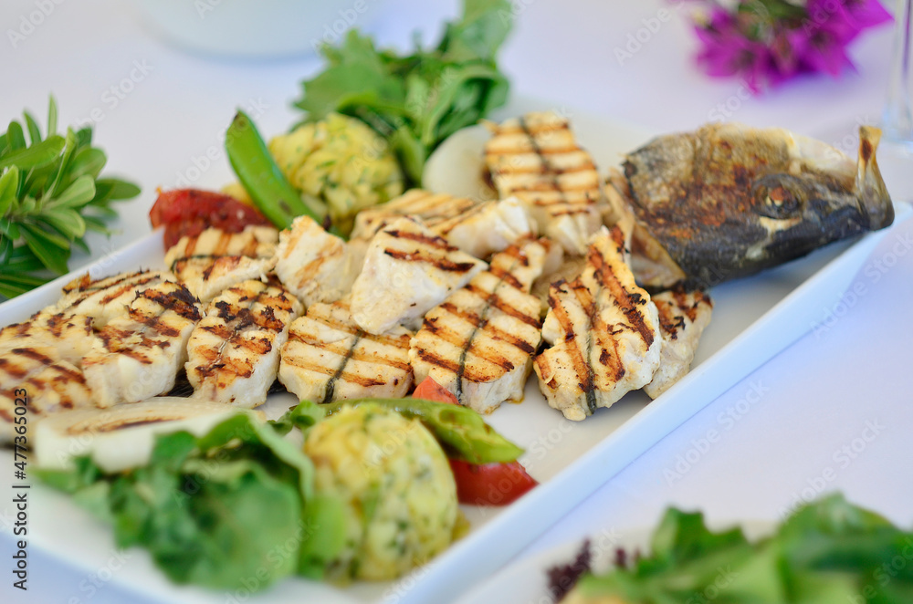 sliced sea bass with white wine and mezes sliced sea bass with white wine and mezes