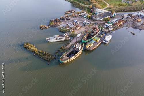 Aerial view of ship wrecks along the lagoon near Tagus river in Corroios, Setubal, Portugal. photo