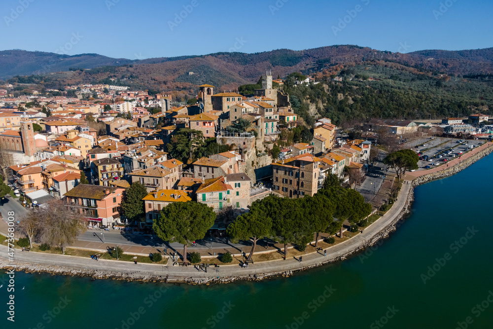 Aerial view of Passignano sul Trasimeno, a small town along the lake near Perugia, Umbria, Italy. Aerial view of Passignano sul Trasimeno, a small town along the lake near Perugia, Umbria, Italy.