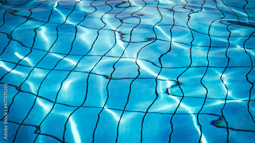Naklejka premium Clear water surface. Blue wave texture, pool water background. Abstract summer sea pattern.