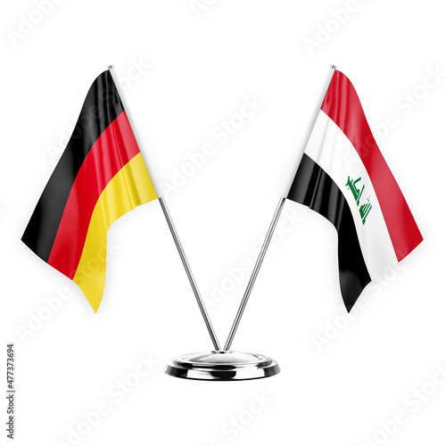 Two table flags isolated on white background 3d illustration, germany and iraq